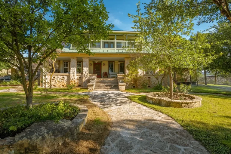 entrance walkway to a ranch home