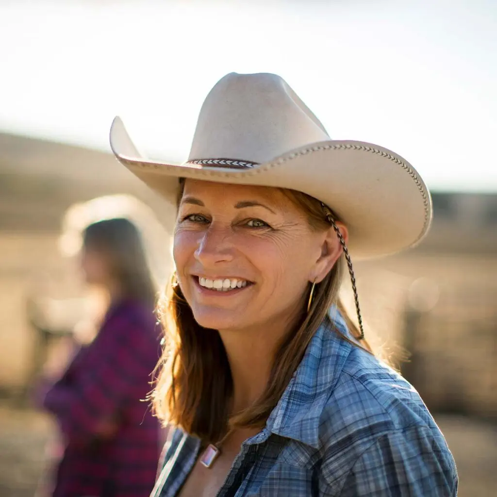 a woman in a cowboy hat