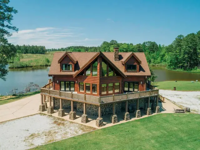 High-Fence Hunting Ranch & Log Home For Sale in Attala County